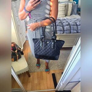 Burberry fabric and leather bag.